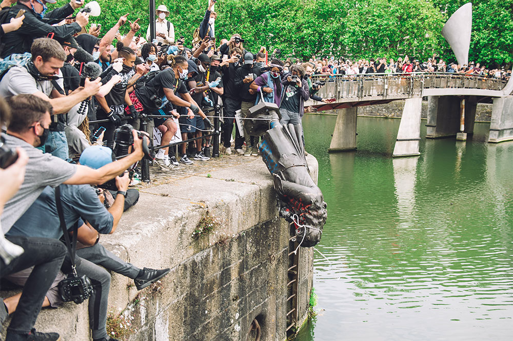 Bronze guilt: the statue of Edward Colston being pushed into Bristol Harbour in June 2020.