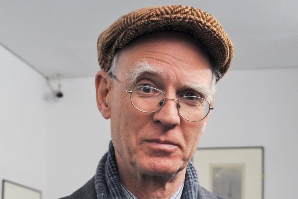 The architectural historian Andrew Saint with a wry, amused expression