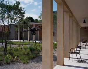 Hauser &amp; Wirth Somerset, Inner Cloister. Left: Louise Bourgeois, Spider (detail), 1994. © The Easton Foundation