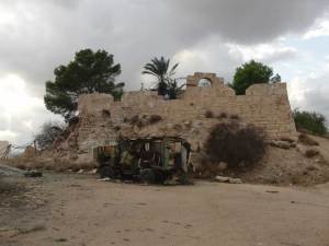 One of six vehicles destroyed by a NATO strike outside the relatively untouched Roman fort at Ras Almargeb, Libya in 2011.