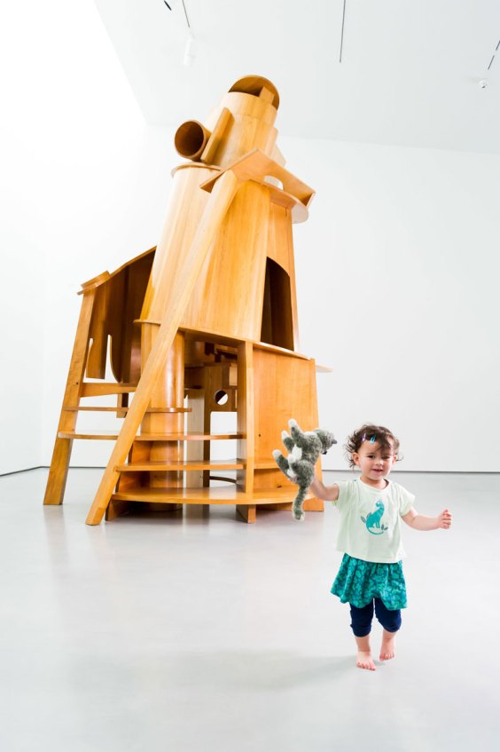 Maisie Angove (2) with Antony Caro's ‘Child's Tower’ at The Hepworth Wakefield.