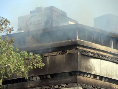 Smoke rises from The National Museum of Natural History in New Delhi on April 26, 2016, after an early morning fire was controlled. No casualties were reported, but the entire collection may have been lost.