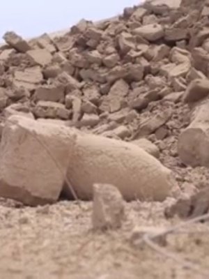 Screenshot from ISIS video showing the destroyed 'mermen' statues of the seven sages at the Fish Gate, Temple of Nabu, Nimrud, Iraq