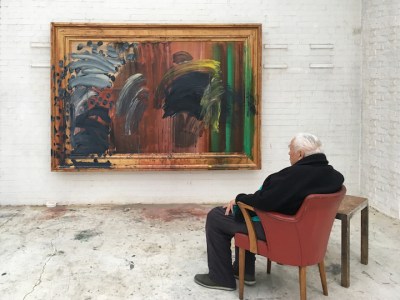 Portrait of Howard Hodgkin featuring Portrait of the Artist Listening to Music (2016), photographed by Miriam Perez. Courtesy Gagosian.