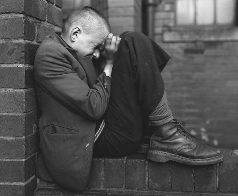  Youth on Wall, Jarrow, Tyneside, 1976 (negative); 1986 (print), Chris Killip. J. Paul Getty Museum, LA. Courtesy the artist 