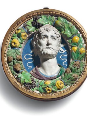 A polychrome glazed terracotta bust of a laureate in a frame of fruit, vegetables and pine cones (c. 1487–94), Andrea della Robbia
