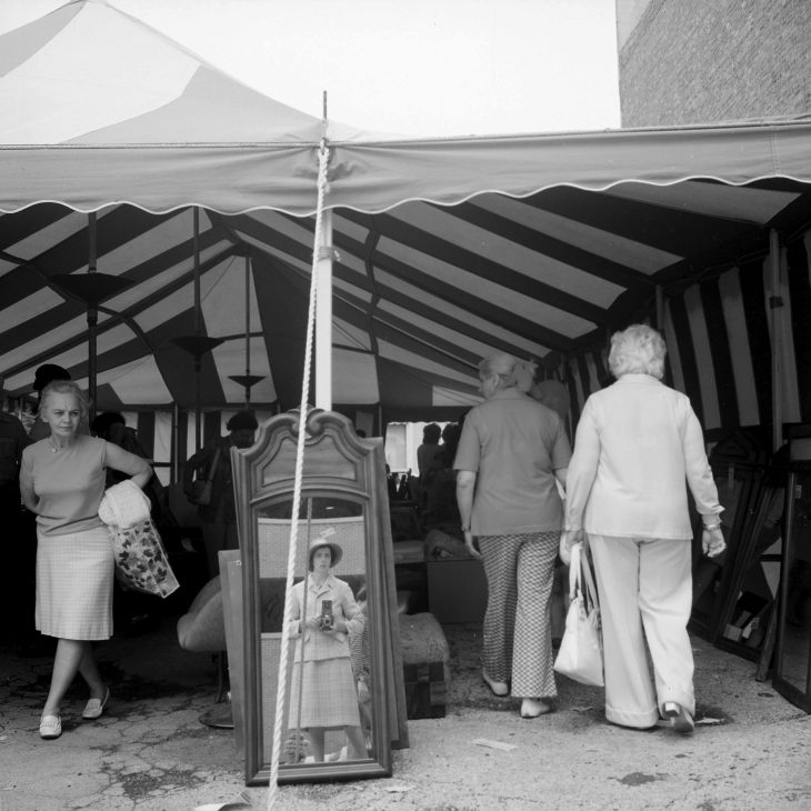 Vivian Maier (1926–2009) often photographed her reflection in mirrors or windows, © 2018 The Estate of Vivian Maier