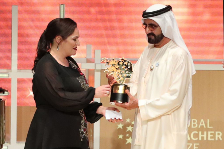 Andria Zafirakou receives the 'Global Teacher Prize' from Sheikh Mohammed bin Rashid al-Maktoum, Vice-President and Prime Minister of the UAE and Ruler of Dubai during an award ceremony in Dubai on 18 March 2018.