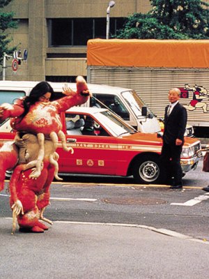 Sorry for suffering – You think I’m a puppy on a picnic? (1990), Lee Bul. Twelve-day performance at Kimpo Airport, Narita Airport, downtown Tokyo and Dokiwaza Theater.