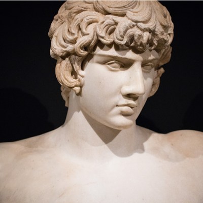 Bust of Antinous with Greek inscription, (AD 130–138), discovered in Balanea, Syria in 1879. Private collection