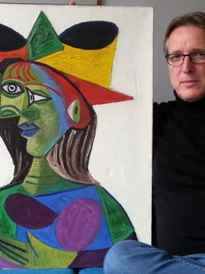 Arthur Brand with the recovered Buste de Femme (1938) by Picasso.