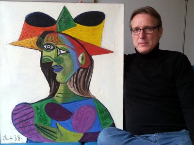 Arthur Brand with the recovered Buste de Femme (1938) by Picasso.