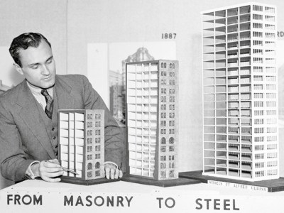 Philip Johnson with models showing ‘the evolution of the modern skyscraper’, shortly before their display at the Museum of Modern Art, New York, in 1933.