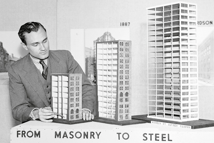 Philip Johnson with models showing ‘the evolution of the modern skyscraper’, shortly before their display at the Museum of Modern Art, New York, in 1933.