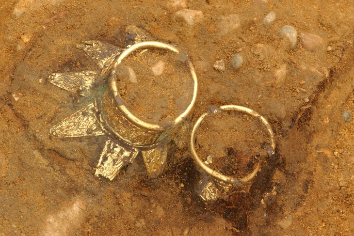 Drinking vessels with decorated gold neck in-situ.