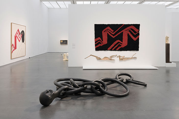 Installation view of ‘Enrico David: Gradations of Slow Release’ at the MCA Chicago in 2018. On the freestanding wall hangs Untitled (Ombre Rosse) (2017) above Untitled (2009).