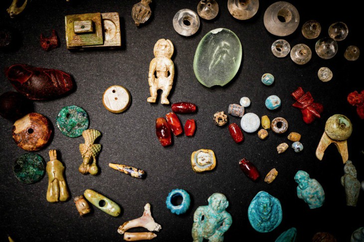 Some of the figurines and gems recently excavated in the House of the Garden at Pompeii.