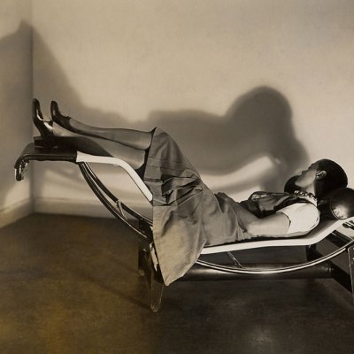 Charlotte Perriand on the ‘chaise longue basculante, B306’ designed by Perriand, Pierre Jeanneret and Le Corbusier in c. 1928.