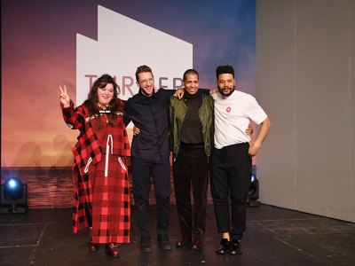 The collective winners of the Turner Prize 2019.