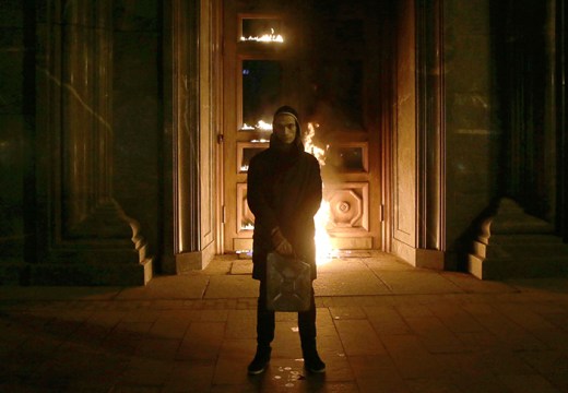 Russian artist Pyotr Pavlensky poses after setting fire to the doors of the headquarters of the FSB security service, the successor to the KGB, in central Moscow early on November 9, 2015. Photo by NIGINA BEROEVA/AFP via Getty Images