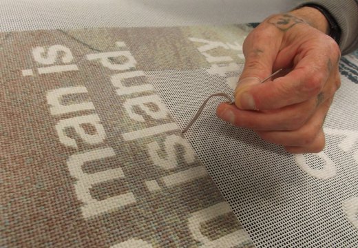 Stitchers working on Wolfgang Tillmans’ No Man is an Island (2019).