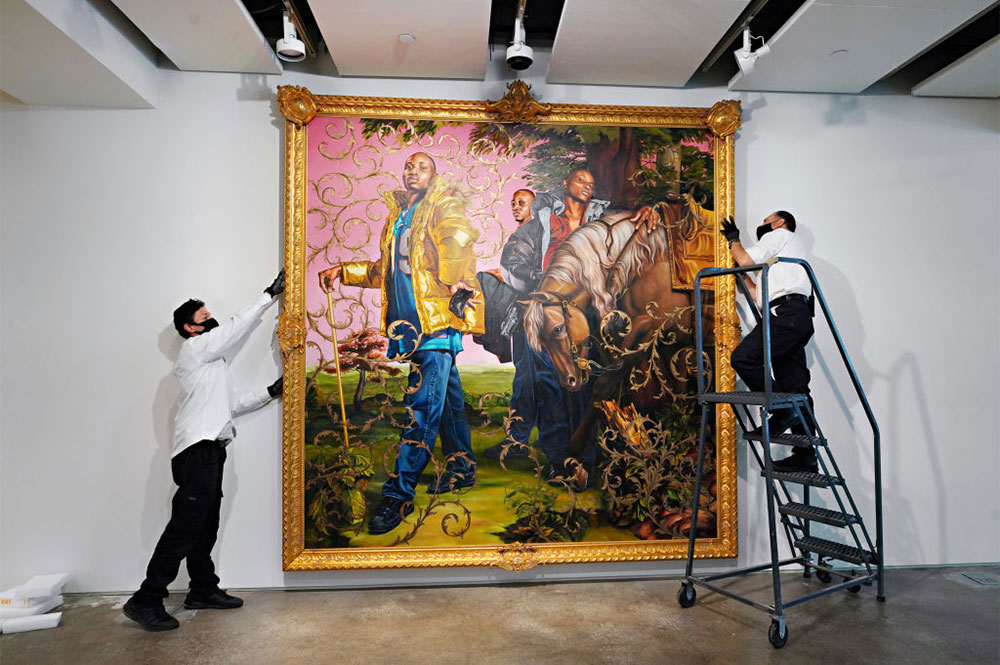 Art handlers preparing Kehinde Wiley’s Le Roi à la Chasse II (2007) to be exhibited ahead of auction at Sotheby’s New York in June 2020.