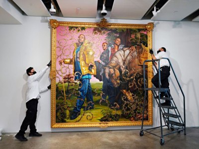 Art handlers preparing Kehinde Wiley’s Le Roi à la Chasse II (2007) to be exhibited ahead of auction at Sotheby’s New York in June 2020.
