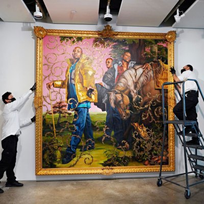Art handlers preparing Kehinde Wiley’s Le Roi à la Chasse II (2007) to be exhibited ahead of auction at Sotheby’s New York in June 2020.