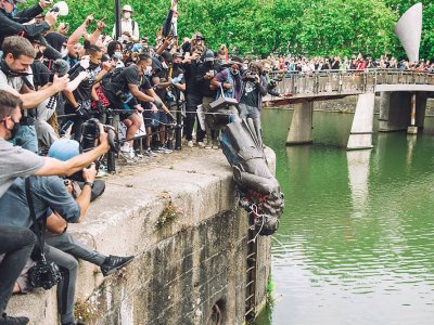 Bronze guilt: the statue of Edward Colston being pushed into Bristol Harbour in June 2020.