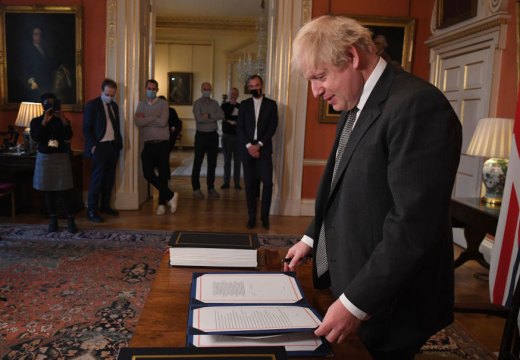 No more red tape? Boris Johnson signs the Brexit deal in December 2020.