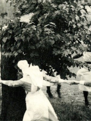 Nurses dance around the Bethnal Green mulberry in 1944, three years after it was bombed.