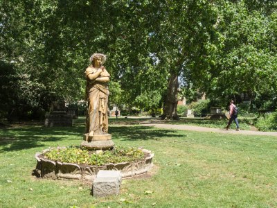 Terracotta statue of Euterpe, the Muse of instrumental music, in St George's Gardens, Bloomsbury.
