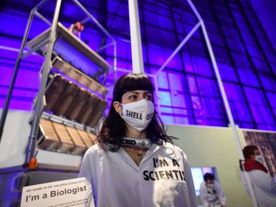 Activists from Extinction Rebellion chained to an exhibit at the Science Museum’s 'Our Future Planet' exhibition, sponsored by Shell, in May 2021.