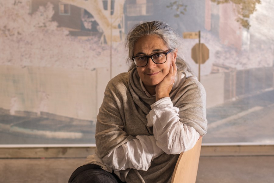 Tacita Dean, photographed in Frith Street Gallery’s Golden Square space in London, in October 2021. Behind her is one of the works in the Purgatory (2021) series.