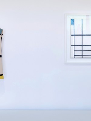Yves Saint Laurent’s Mondrian dress (Autumn-Winter 1965), displayed next to Piet Mondrian’s Composition en rouge, bleu et blanc (1937).