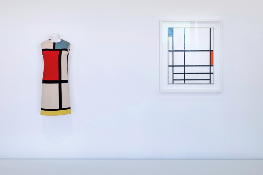 Yves Saint Laurent’s Mondrian dress (Autumn-Winter 1965), displayed next to Piet Mondrian’s Composition en rouge, bleu et blanc (1937).