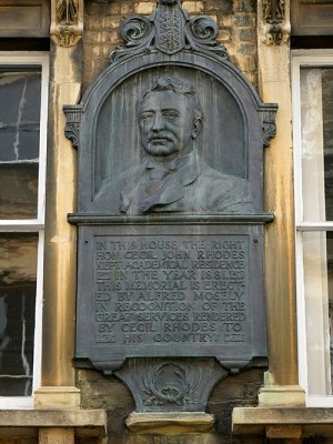 Not falling any time soon: plaque dedicated to Cecil Rhodes in King Edward Street, adjacent to Oriel College, Oxford.
