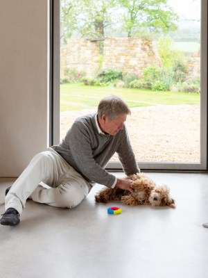 John Pawson and his pooch Lochie. Courtesy Dylan Thomas
