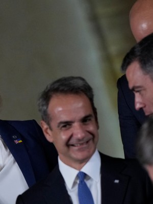 Liz Truss, with Greek Prime Minister Kyriakos Mitsotakis (second from left). Photo: Alastair Grant/Pool/Getty Image