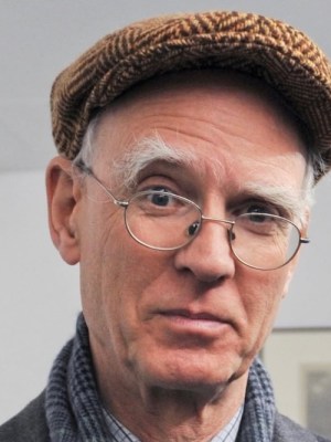 The architectural historian Andrew Saint with a wry, amused expression